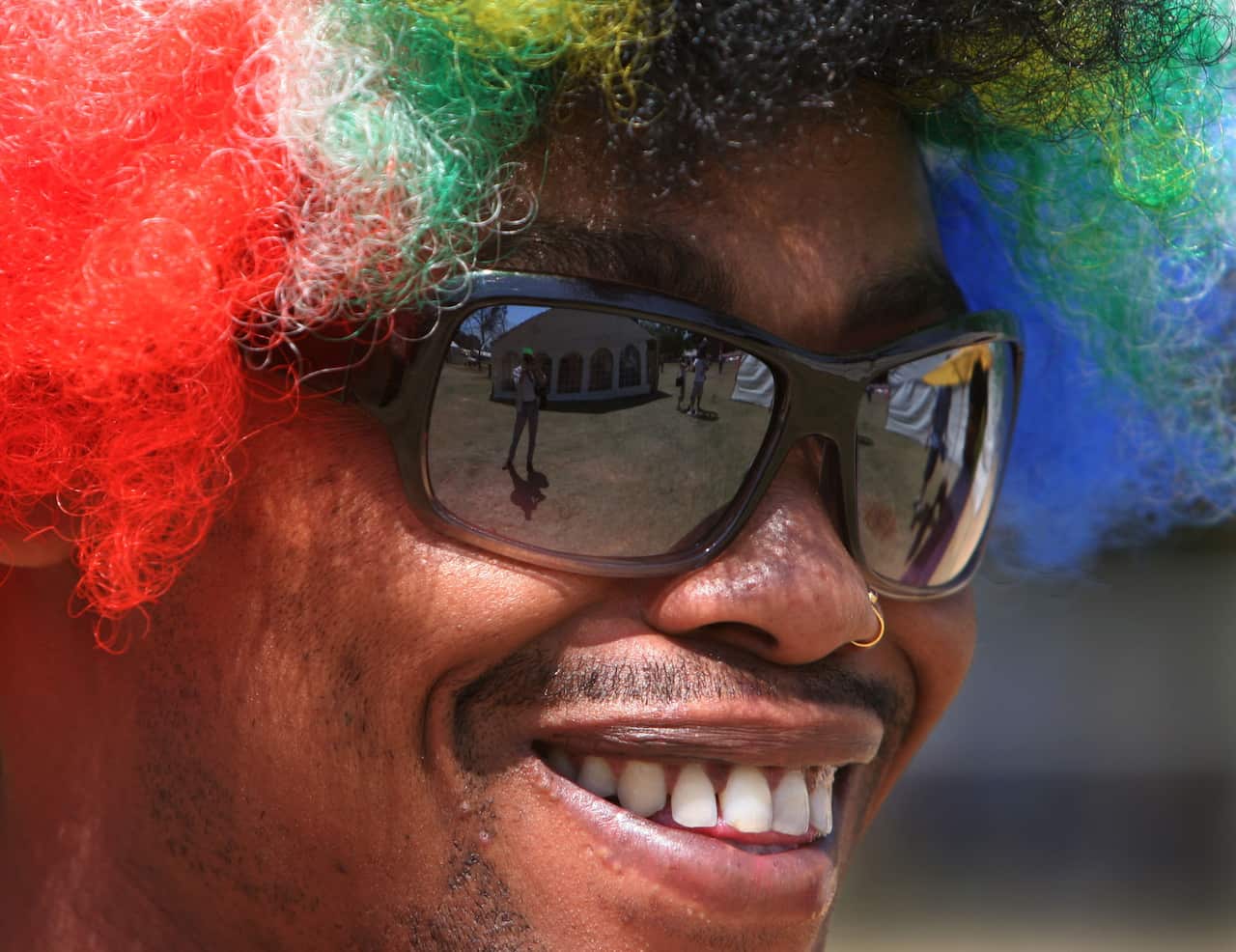 An unidentified man takes part in Johannesburg's 17th Gay Pride parade Saturday, Sept. 30, 2006. Last week South Africa's former deputy president Jacob Zuma drew fresh controversy  after he called homosexuality un-African and criticized plans to legalize 