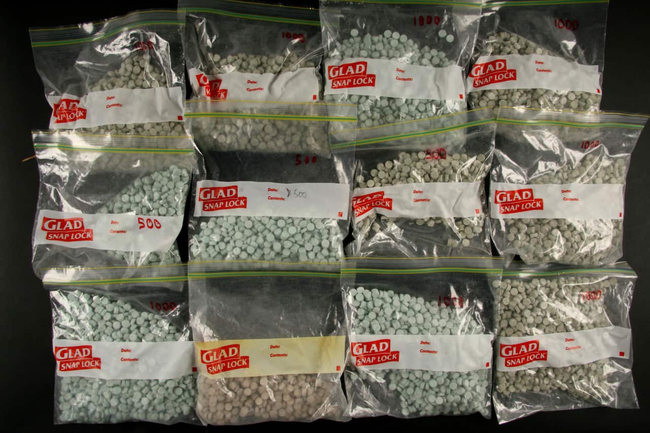 A sample of the 10,000 pills seized by Queensland Police in a search of a car stopped on the Pacific Highway at Yatala, south of Brisbane.