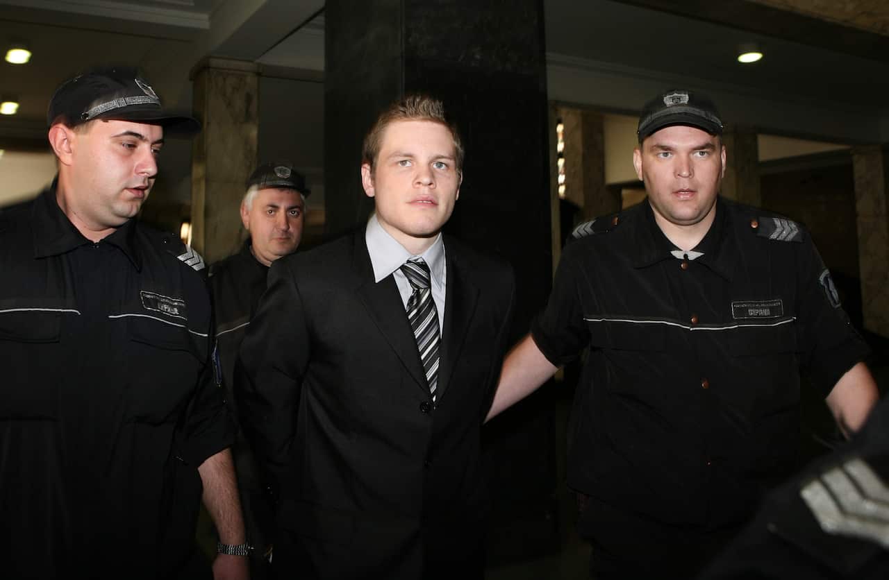 Police escort then 21-year-old Australian Jock Palfreeman at the Sofia City Court in 2008.