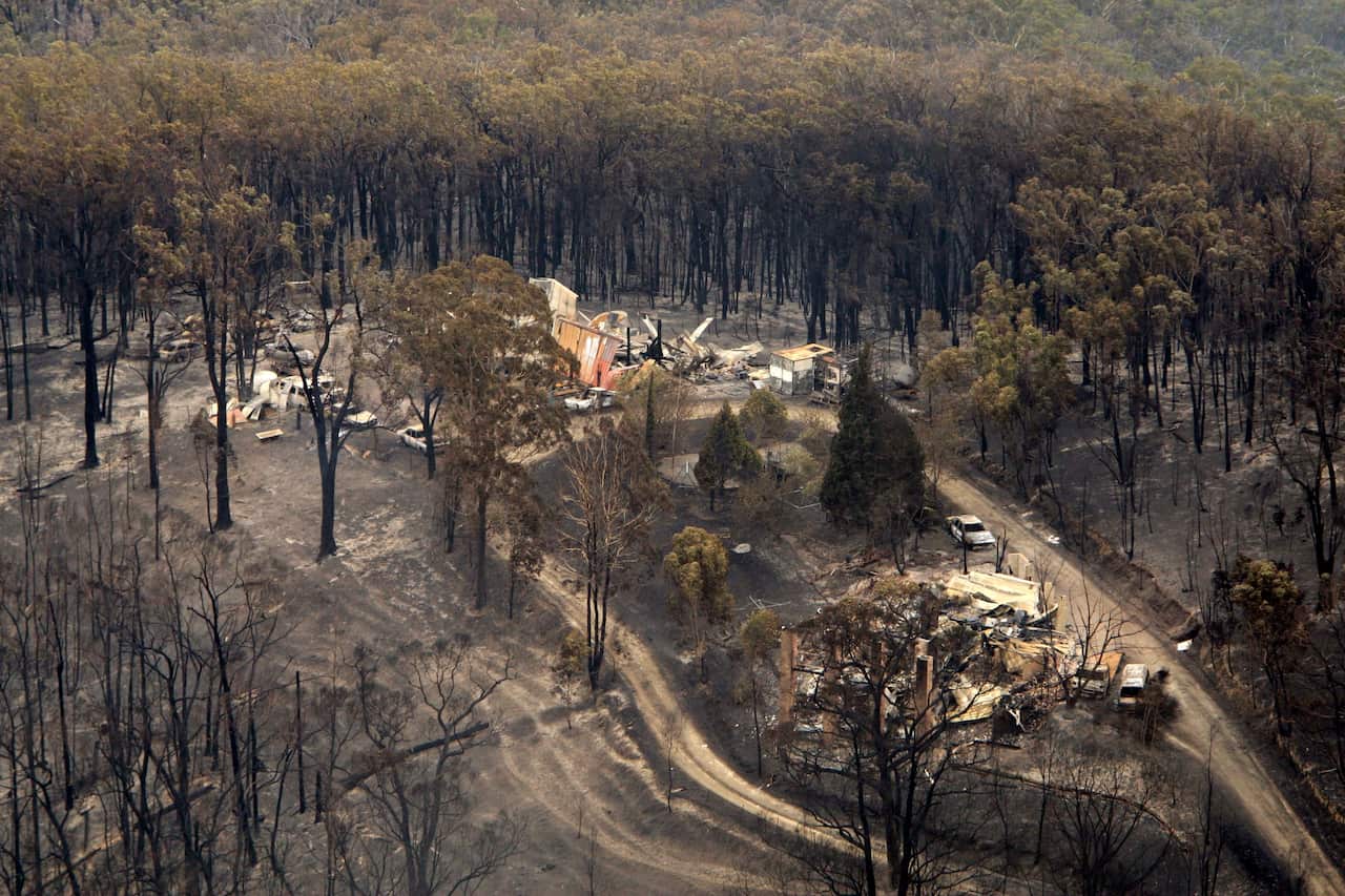An aerial view of property destroyed by bushfires near Kinglake, north east of Melbourne, Sunday, Feb. 8, 2009. Fires across Victoria have taken 107 lives and injured many more.