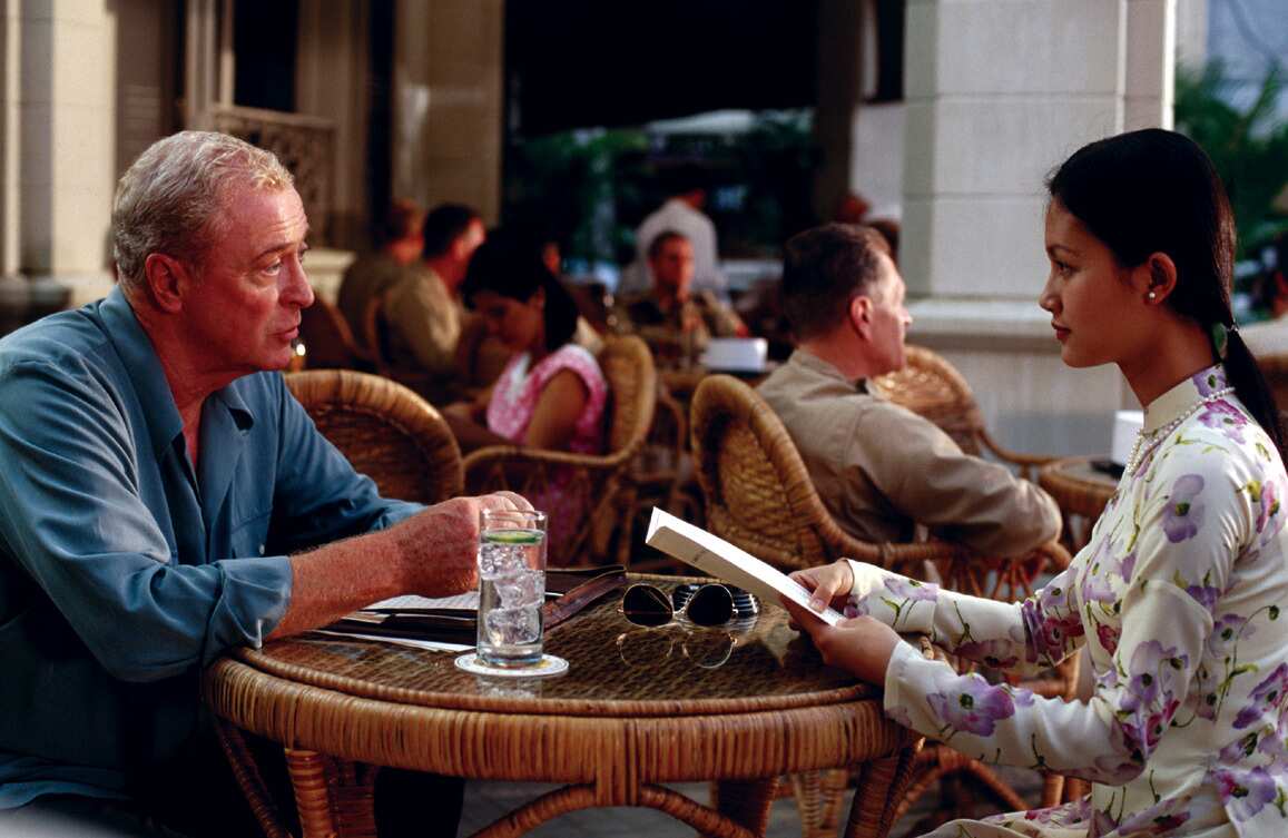 Michael Caine and Do Thi Hai Yen in Phillip Noyce's THE QUIET AMERICAN [US 2002]