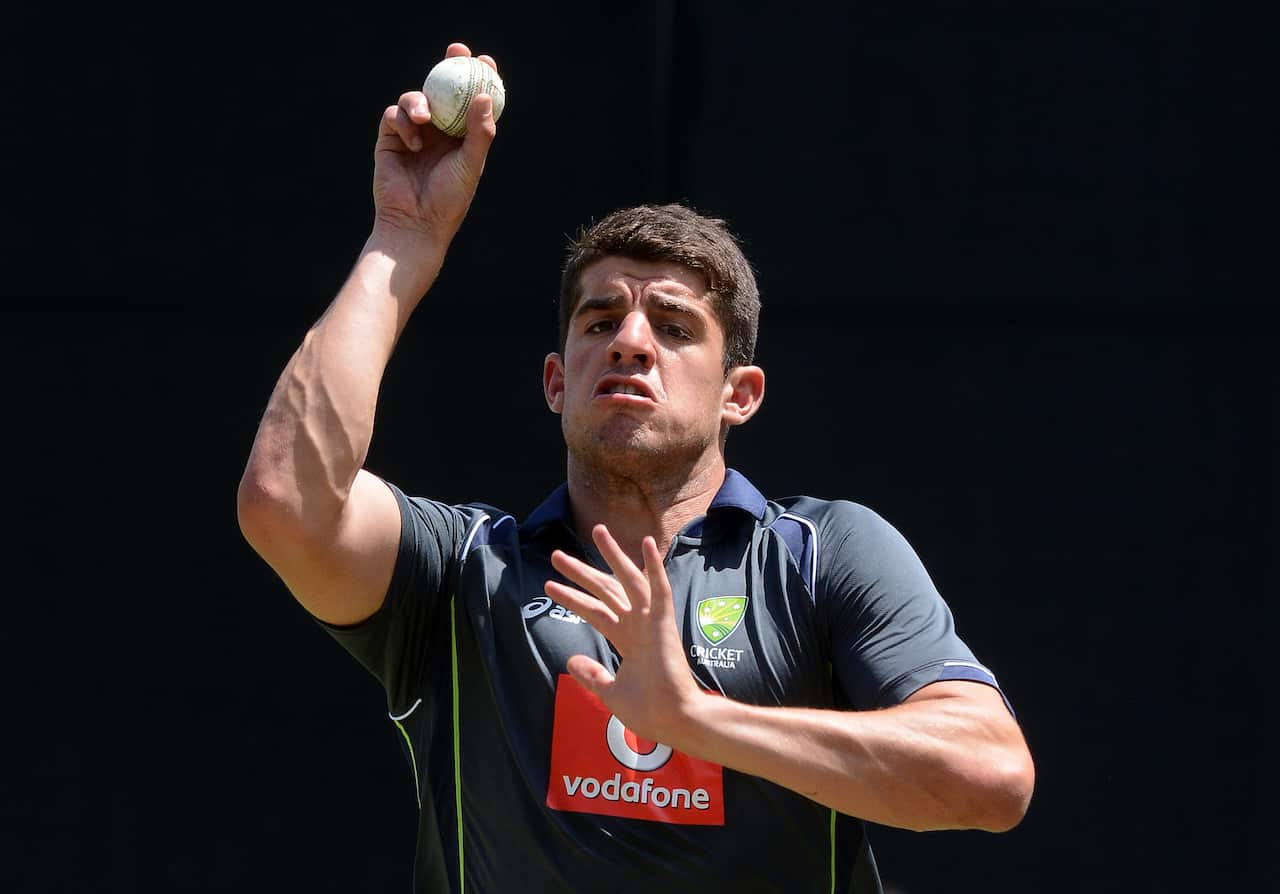 Moises Henriques prepares to bowl during the Australian team training session at the Gabba  in  Brisbane, Thursday, Jan. 17, 2013.. (AAP Image/Dave Hunt) NO ARCHIVING