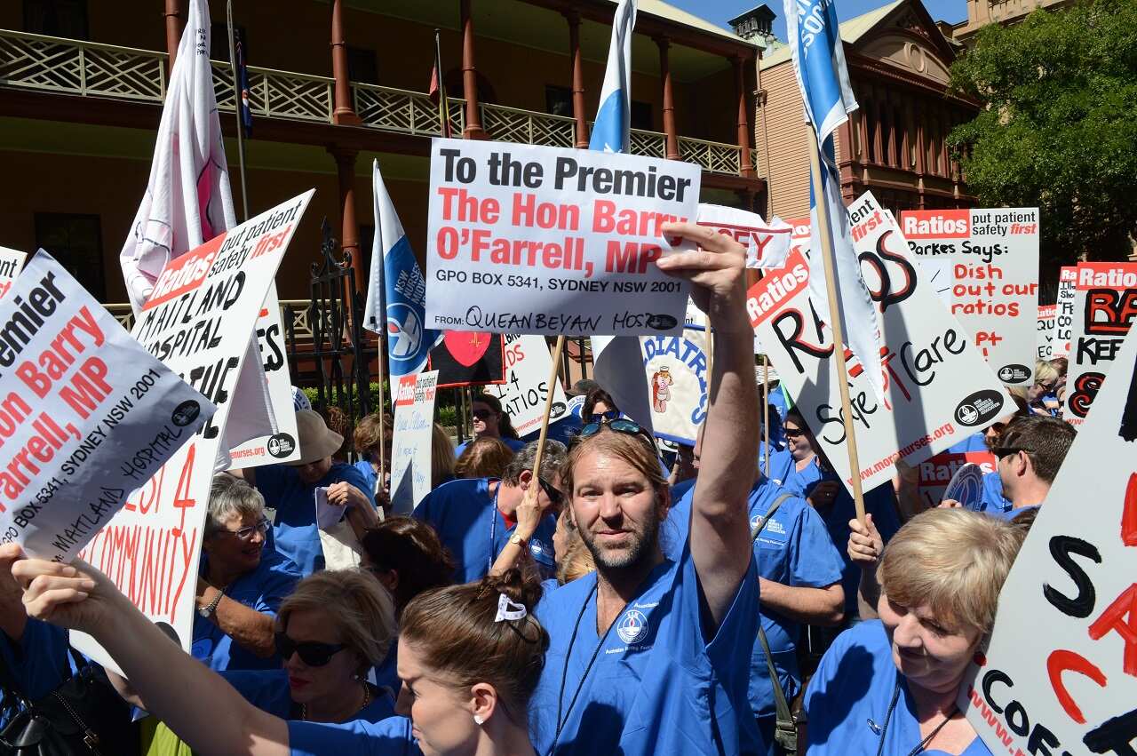 Nurses from regional New South Wales hold a rally outside the NSW Parliament in Sydney, Tuesday, March 19, 2013.