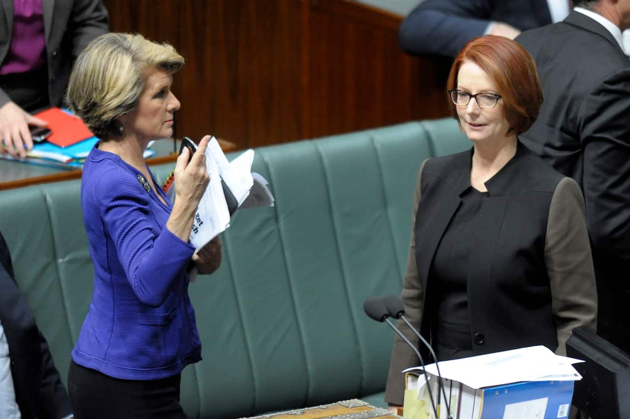 Former prime minister Julia Gillard and former foreign minister Julie Bishop in 2013.