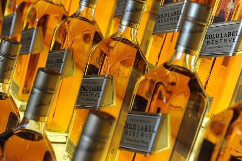 Johnnie Walker bottles in the Johnnie Walker marquee.