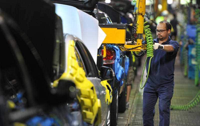 File photo of new cars rolling along the assembly line at the Ford Manufacturing Plant in Broadmeadows, Melbourne.