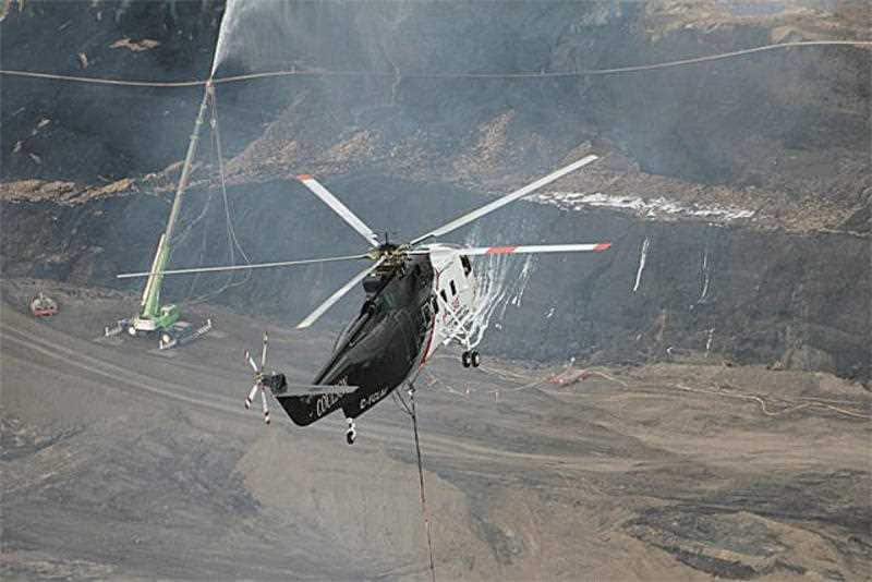 Supplied image of firefighters battling a blaze at the Hazelwood open cut coal mine near Morwell, Victoria, Wednesday, March 5, 2014. 