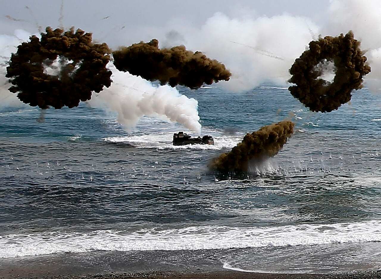 US and South Korean marines participate in an annual Combined Joint Logistics over the Shore exercise against a possible attack from North Korea, in Pohang, 31 March 2014.