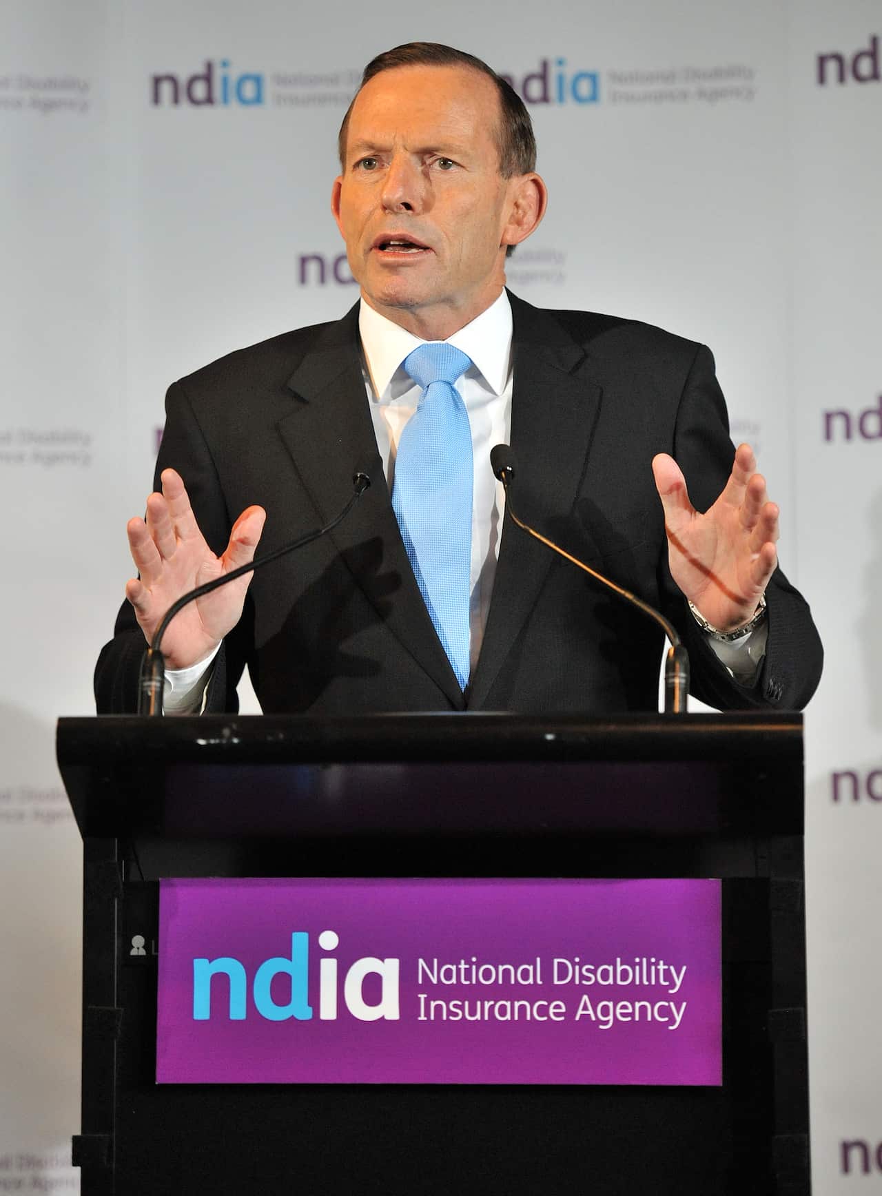 Prime Minister Tony Abbott addresses an audience at the Sheraton Hotel in Geelong, Wednesday, April 30, 2014. Mr Abbott was in Geelong to open the National Disability Insurance Agency headquarters. (AAP)