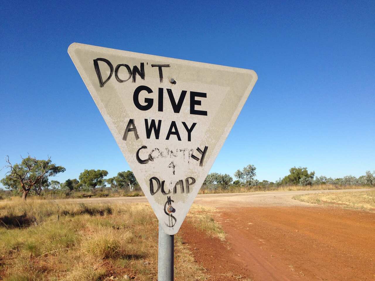 A sign at the Stuart Highway turn-off to Muckaty Station, 120km north of Tennant Creek