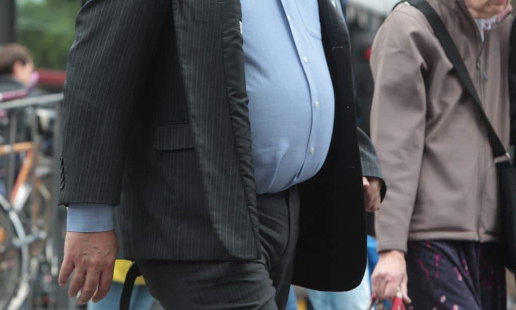 More time sitting means less time burning calories, and obesity is a risk factor for disease. (AAP)