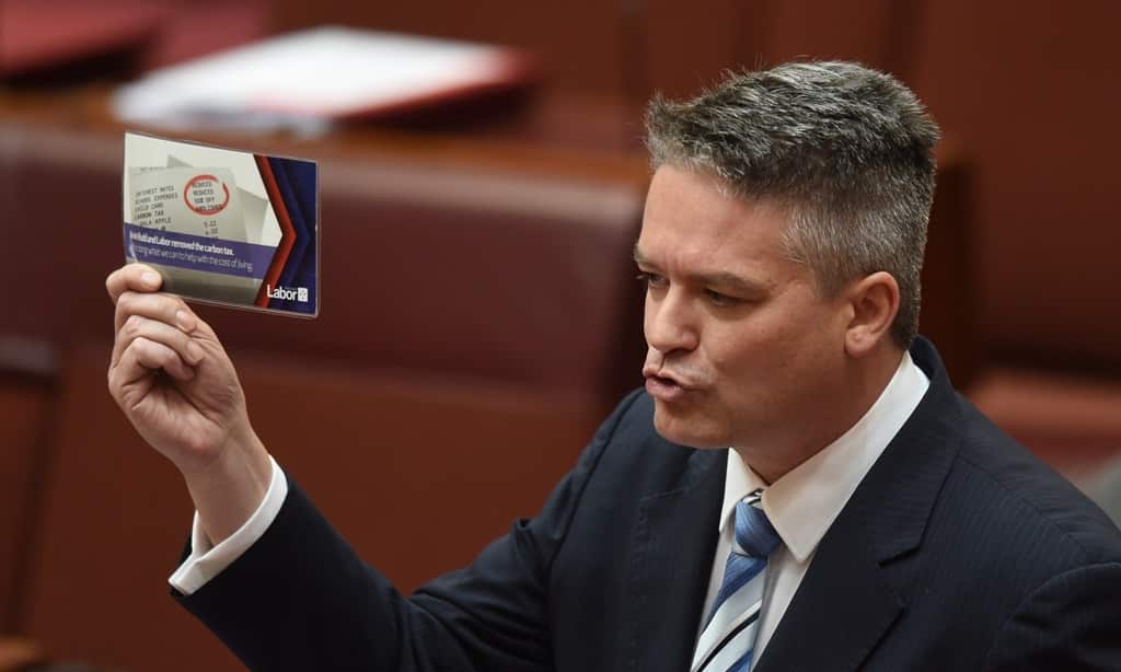Finance minister Mathias Cormann speaks during the carbon tax repeal debate in the Senate chamber at Parliament House in Canberra, Wednesday, July 16, 2014. (AAP)