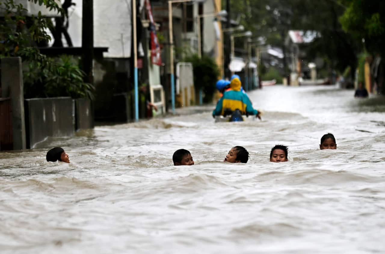 Typhoon Halong floods the town of Hermosa, Bataan province, the Philippines