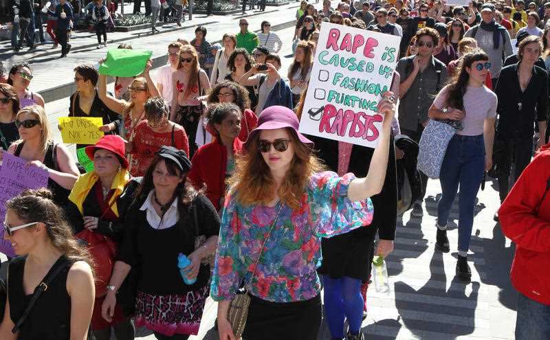 Protesters march in the Melbourne "Slut Walk" in 2014.