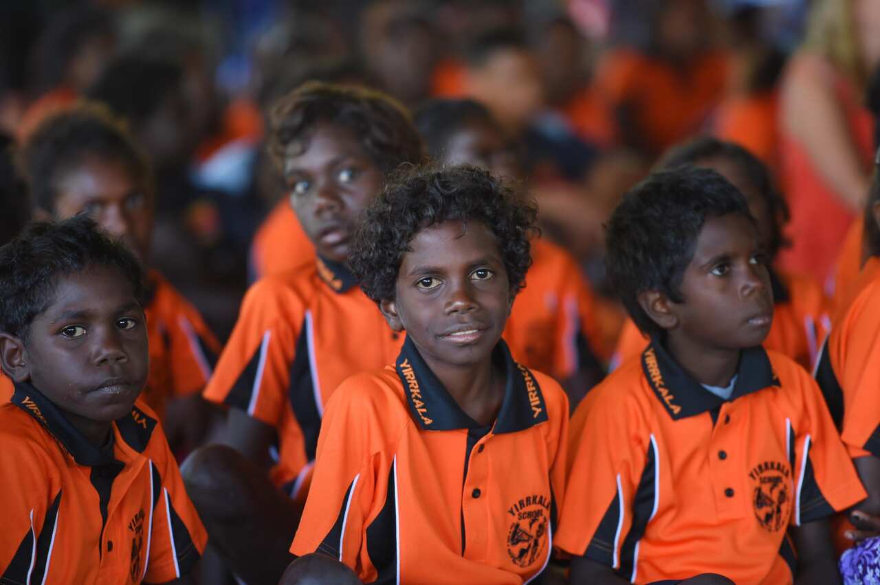 Students listen to Australian Prime Minister Tony Abbott speak at Yirrkala School at Yirrkala on the Gove Peninsula, Northern Territory.