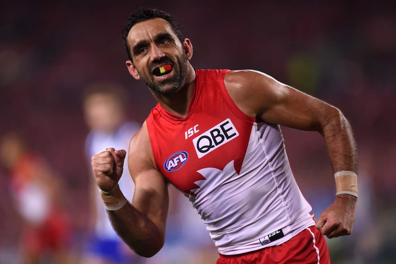 Adam Goodes celebrates kicking a goal against the North Melbourne.