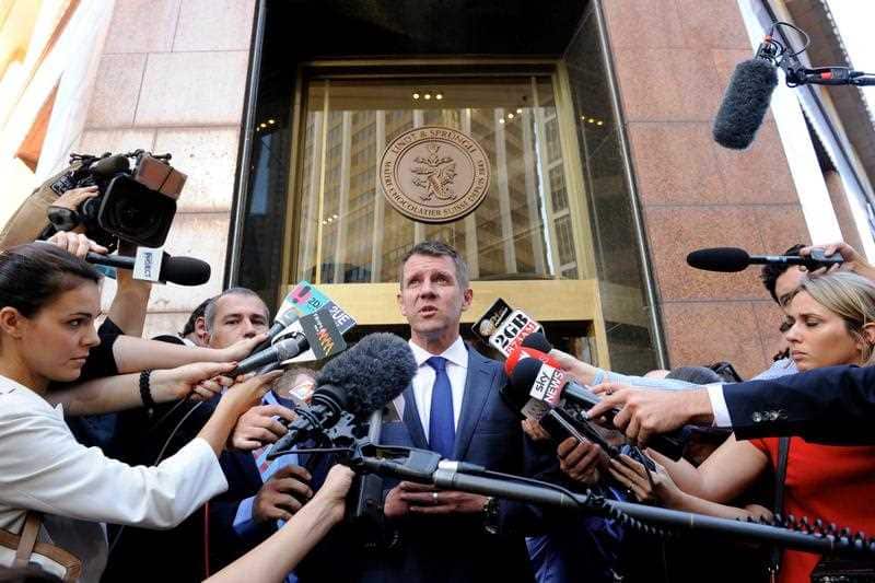 NSW Premier Mike Baird speaks to the media after visiting the Lindt Cafe at Martin Place, Sydney.