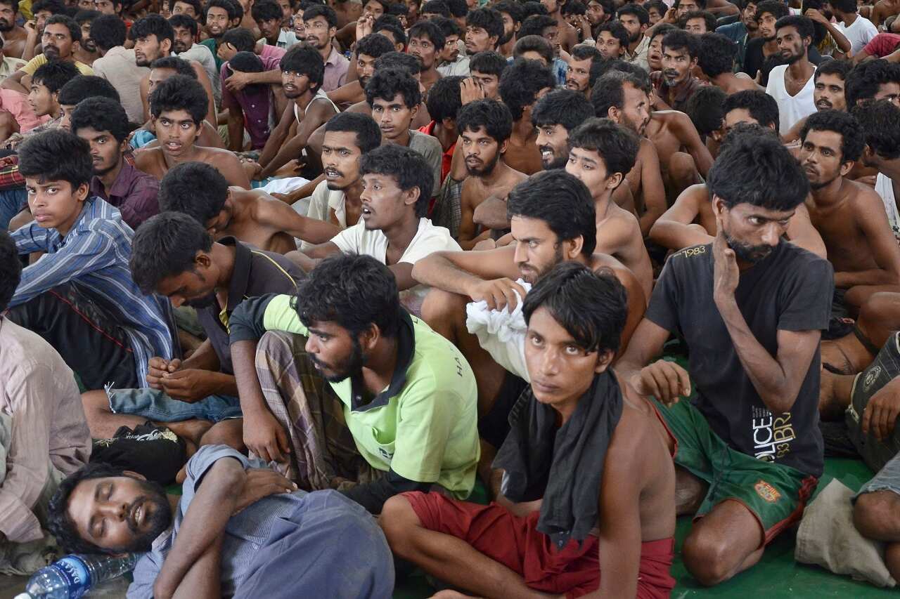 Rohingya refugees waiting at a prison in Malaysia. Many seek refuge in neighbouring countries.