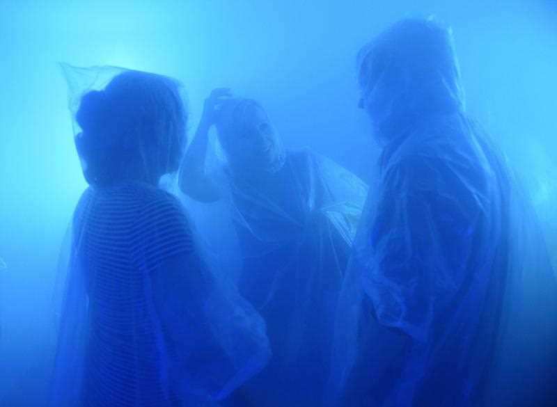 Partygoers wear ponchos at London’s Bompas and Parr’s Architecture Bar. The air is filled with a ‘cocktail mix’, of one part spirits to three parts mixer