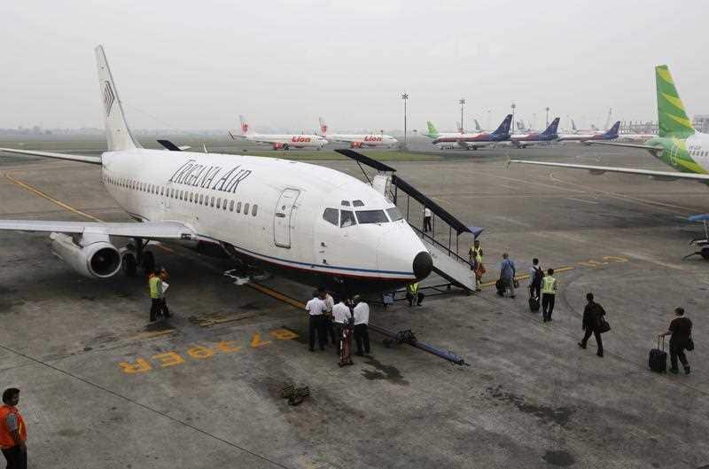 A file picture dated 02 September 2013 shows a Trigana Air plane at Jakarta Soekarno-Hatta International Airport in Jakarta, Indonesia. (EPA/BARBARA WALTO)
