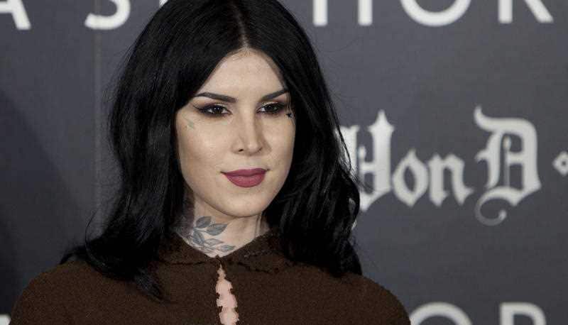 US tattoo artist Kat Von D poses for photographers during the presentation of her new line of makeup in Madrid, Spain, Wednesday, Oct. 7, 2015.