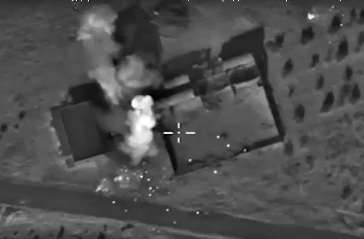 An aerial view of bomb explosions at A fortified position, what Russia says was an Islamic State (ISIS or IS) terrorist ammunition depot after a strike carried out by Russian warplanes in Syrian territories (EPA/RUSSIAN DEFENCE MINISTRY)