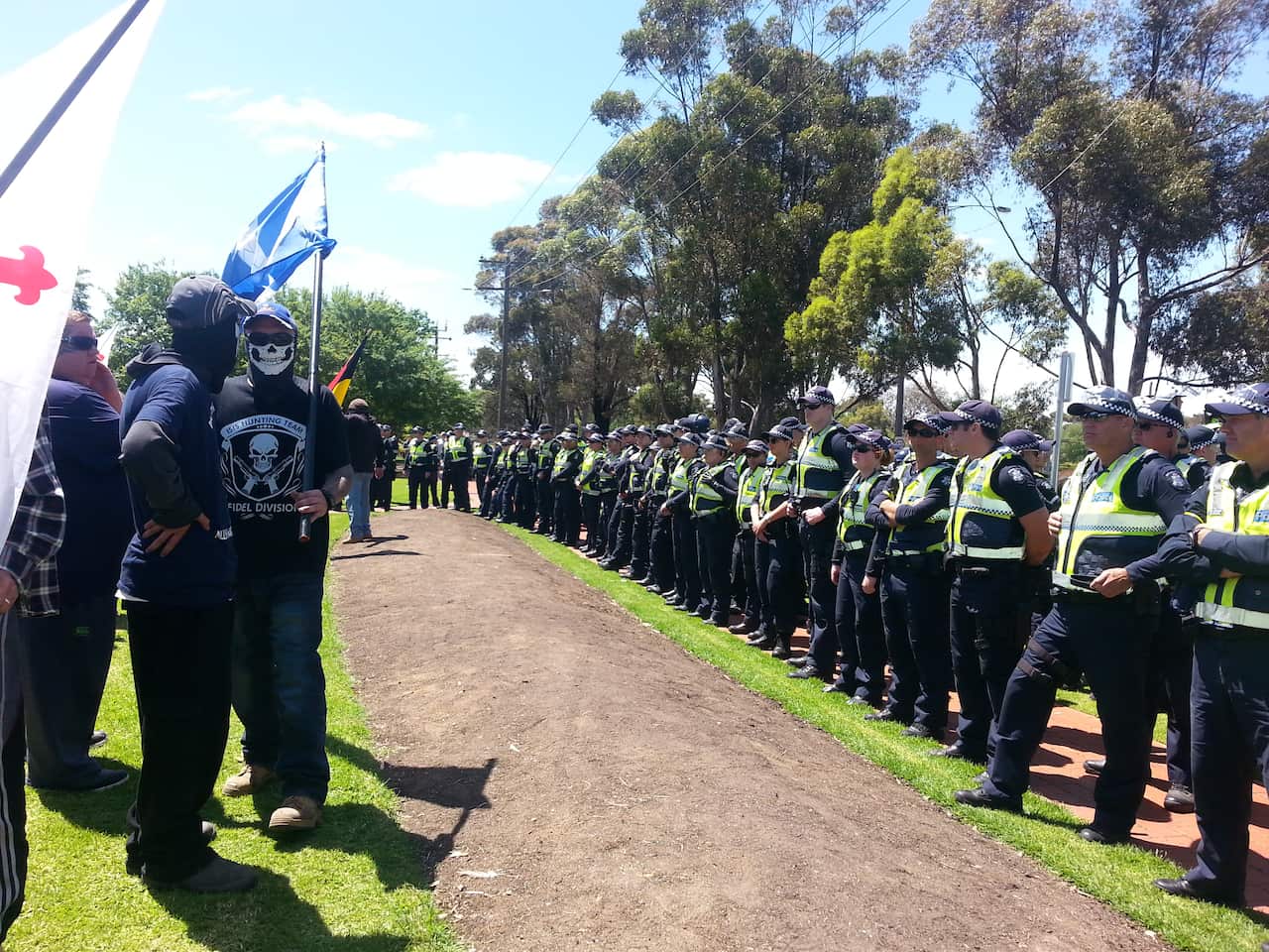 Police face off with protesters at a Reclaim Australia rally in Melbourne. (SBS/Sacha Payne)
