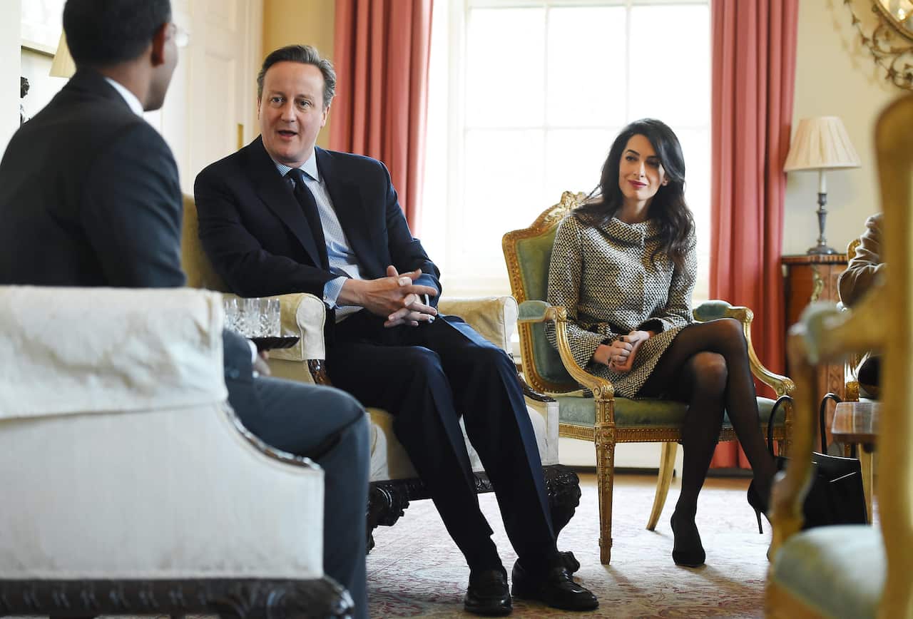 Former Prime Minister David Cameron hosts Mohamed Nasheed and Amal Clooney at 10 Downing Street in London, Britain, 23 January 2016.