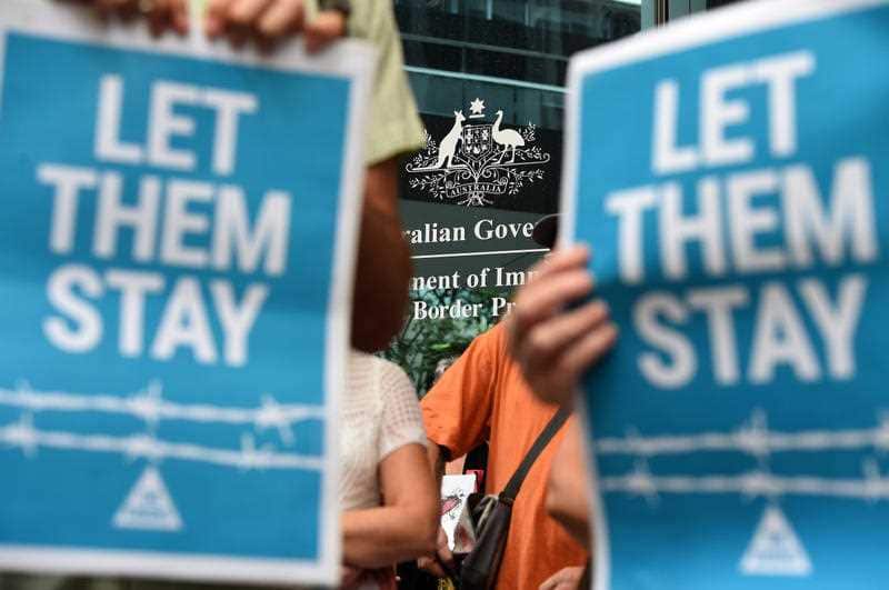 Pro-refugees protesters rally outside the Immigration Office in Brisbane