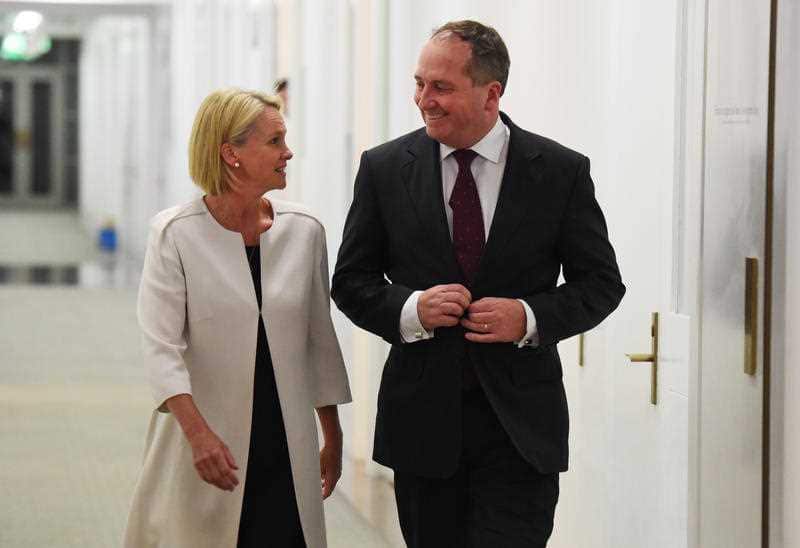 Newly elected Nationals deputy leader Fiona Nash and newly elected leader Barnaby Joyce walk out after a leadership ballot at Parliament House in Canberra on Thursday, Feb. 11, 2016.