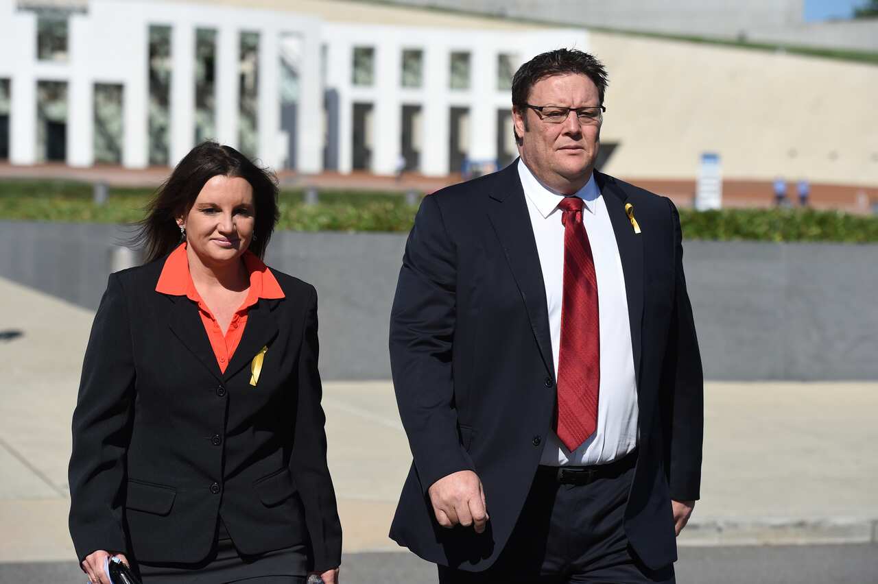 Independent Senators Jacqui Lambie  and Glenn Lazarus arrive to address a crowd of defence veterans at Parliament House in Canberra on Wednesday, March 2, 2016. (AAP Image/Mick Tsikas) NO ARCHIVING