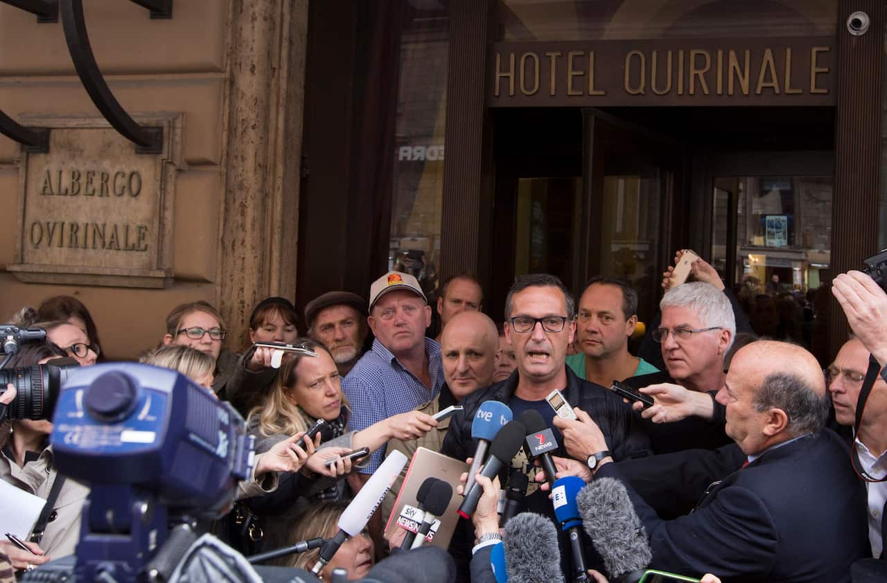 David Ridsdale talks to reporters outside of the Quirinale hotel after their meeting with Australian cardinal George Pell