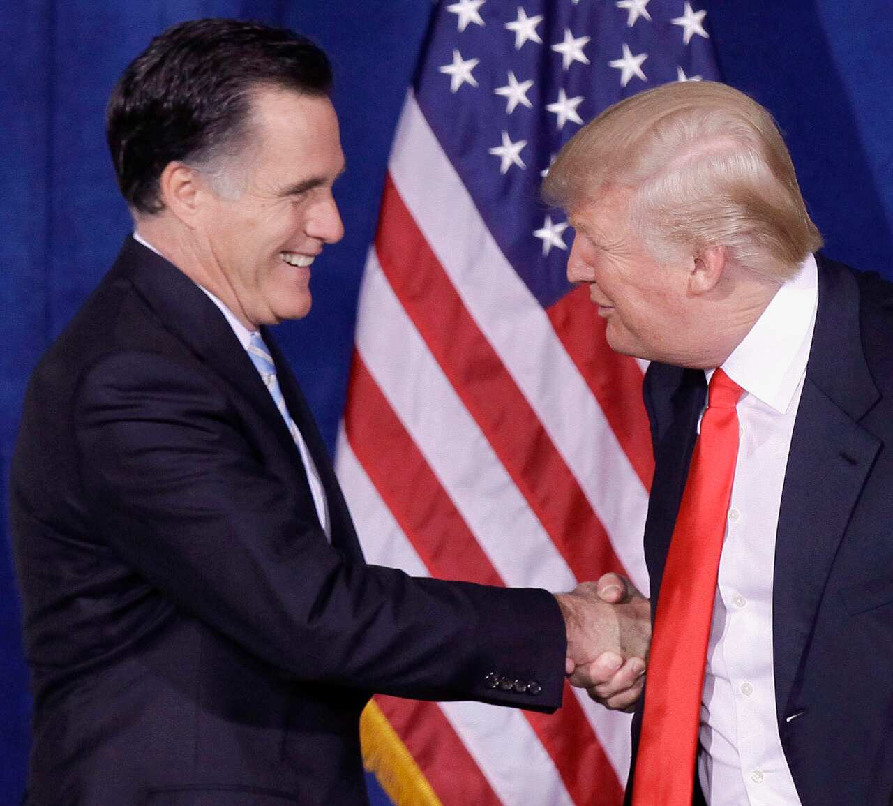 Happier times. In this 2012 file photo Donald Trump greets then-Republican presidential candidate Mitt Romney, after announcing his endorsement of Romney.