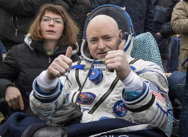 Scott Kelly of the U.S. reacts after landing near the town of Dzhezkazgan, Kazakhstan.