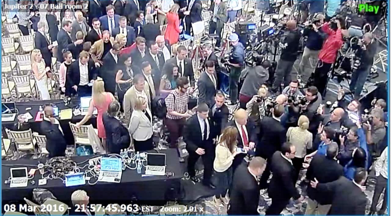 Manager Corey Lewandowski allegedly grabbed former Breitbart reporter Michelle Fields (wearing white shirt at bottom C next to Trump in dark suit and red tie)