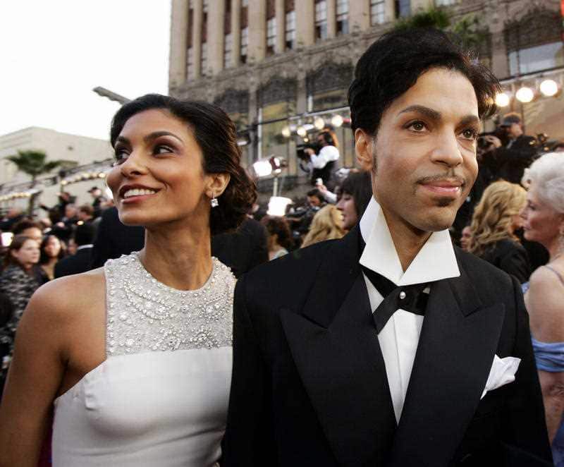 In this Feb. 27, 2005 file photo, singer Prince arrives with his wife Manuela Testolini for the 77th Academy Awards in Los Angeles. 