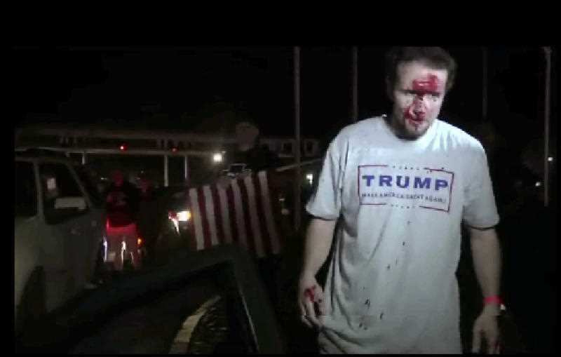 This still image taken from video shows a supporter of Republican presidential candidate Donald Trump. (AP)