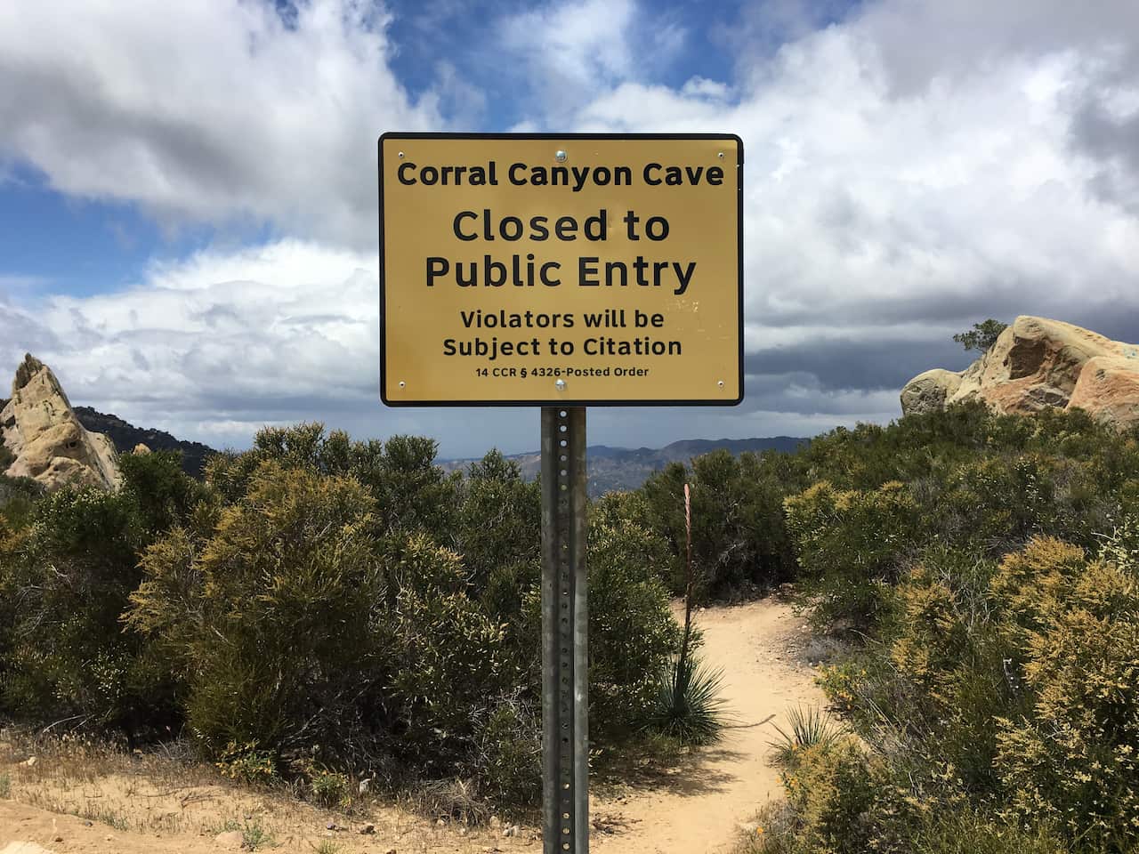 A sign warns visitors of the closure of the Corral Canyon Cave in Malibu, Calif., Friday, May, 6, 2016.