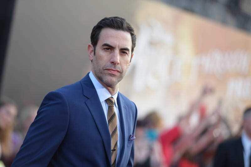 Sacha Baron Cohen arrives at the premiere of "Alice Through the Looking Glass" at the El Capitan Theatre on Monday, May 23, 2016, in Los Angeles.
