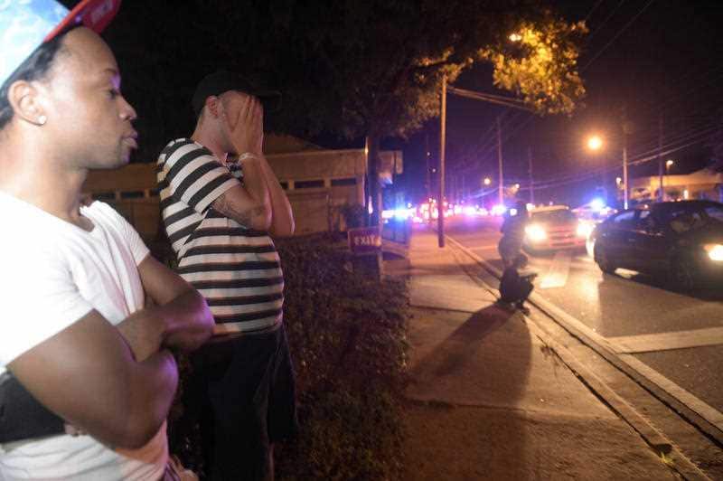 Concerned friends and family of victims at the Pulse nightclub wait outside of the Orlando Police Department