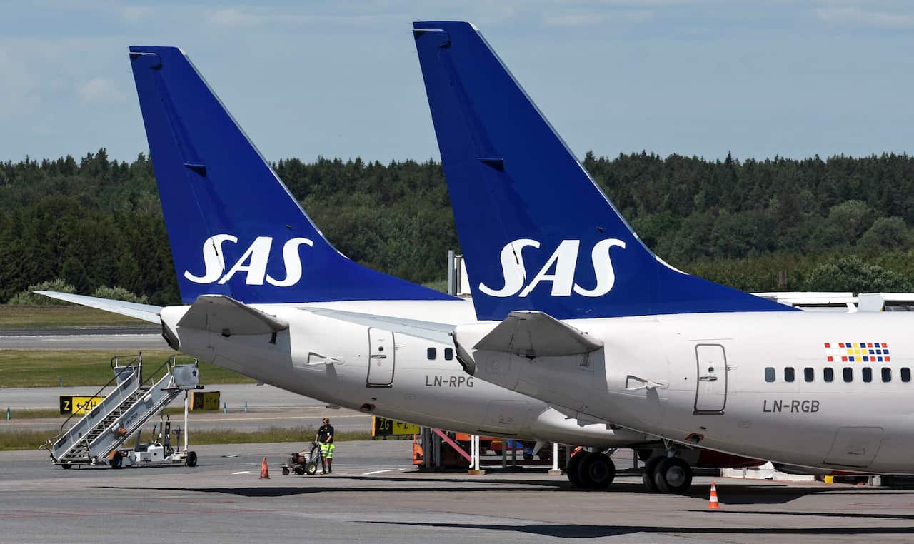 Two SAS Boeing 737 aircrafts parked at Terminal 4 during the SAS pilots strike at Arlanda Airport in Stockholm, Sweden.