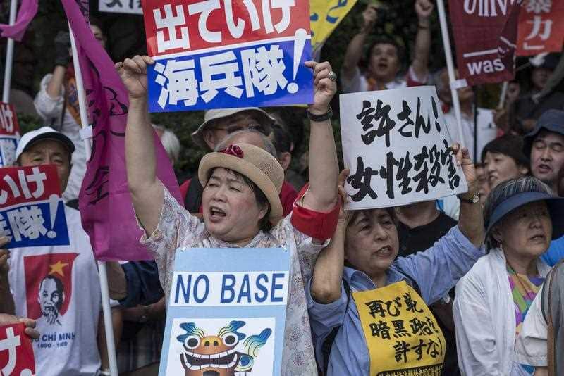 Okinawa residents stage a protest rally against US Military bases in Naha in Okinawa.