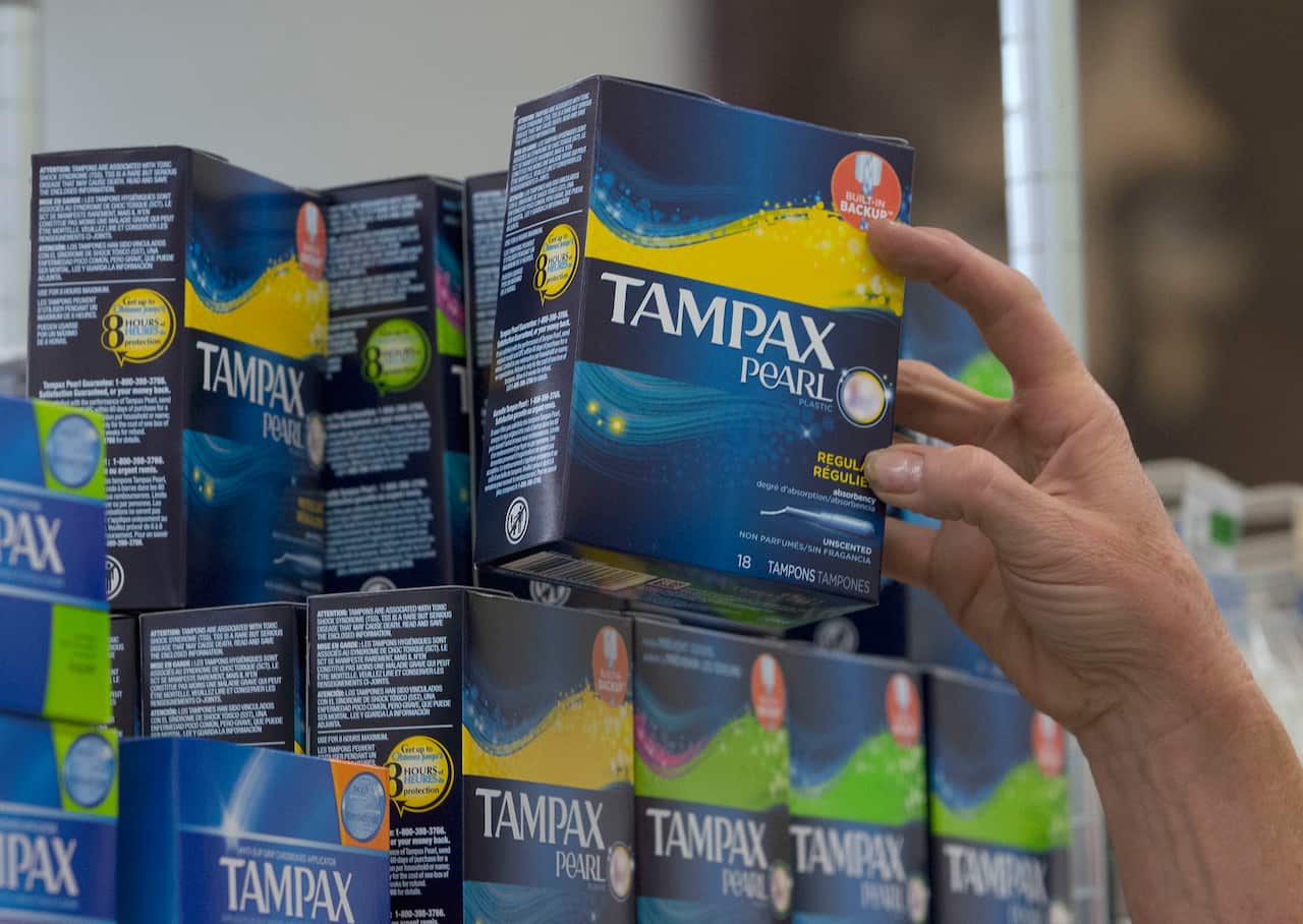  Tampons are restocked at a supermarket. 