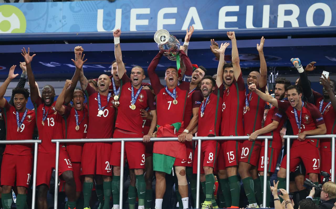 Cristiano Ronaldo of Portugal lifts the trophy after the 2016 UEFA European Championship