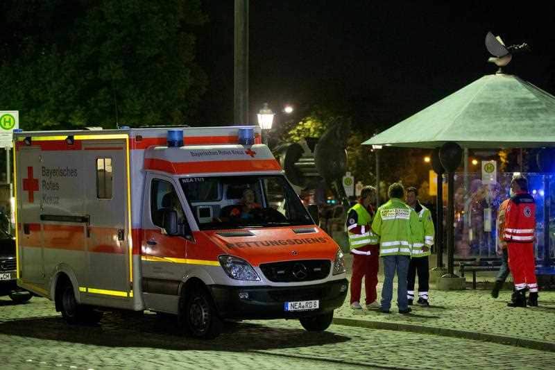 An ambulance is seen at the scene of an explosion in Ansbach, Germany