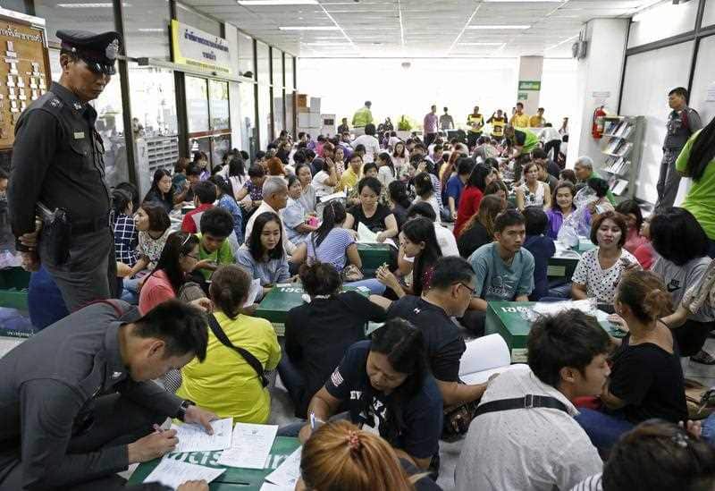 Thai electoral volunteer officials prepare ballot boxes and ballot papers for the referendum on a new constitution at Ratchathewi District Office in Bangkok, Thailand, 06 August 2016. EPA