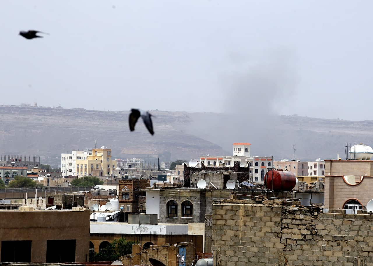 Smoke billows rise above the city following a Saudi-led airstrike targeting a Houthi position in Sana'a, Yemen, 15 August 2016. 