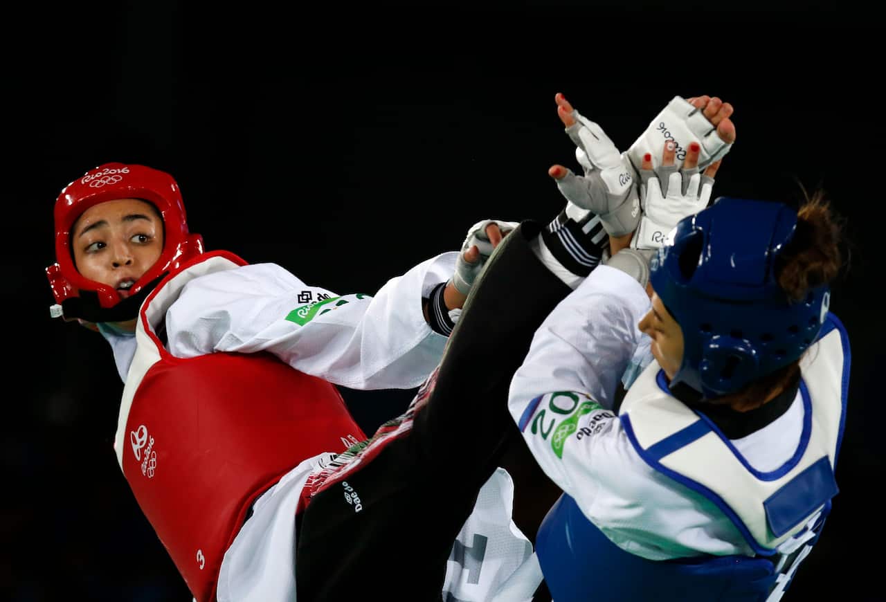 Eva Calvo Gomez of Spain (blue) and Kimia Alizadeh of Iran (red) during the Rio 2016 Olympic Games.