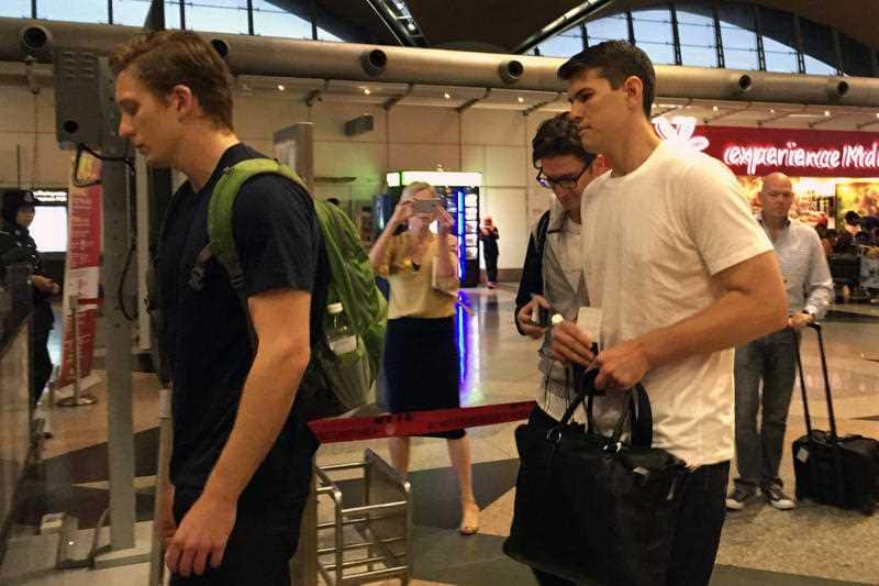 (L-R) Thomas Whitworth, Adam Pasfield and James Paver, three of the nine Australian men arrested in Malaysia at the Kuala Lumpur International Airport 