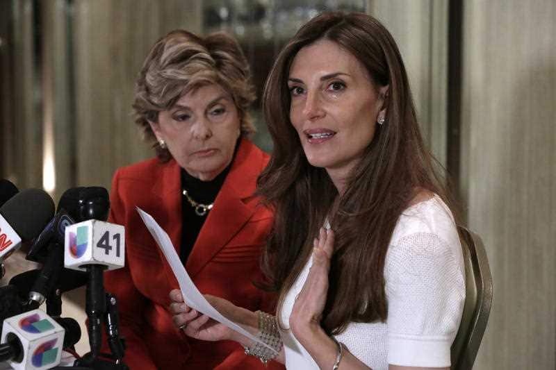 Karena Virginia addresses the media during a news conference with her lawyer Gloria Alred in New York, Thursday, Oct. 20, 2016.